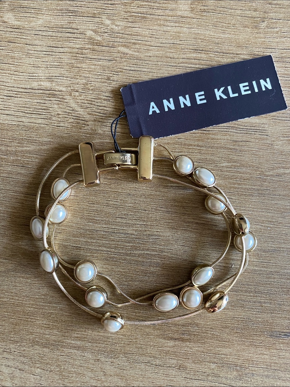 Anne Klein gold bracelet with pearl detailing